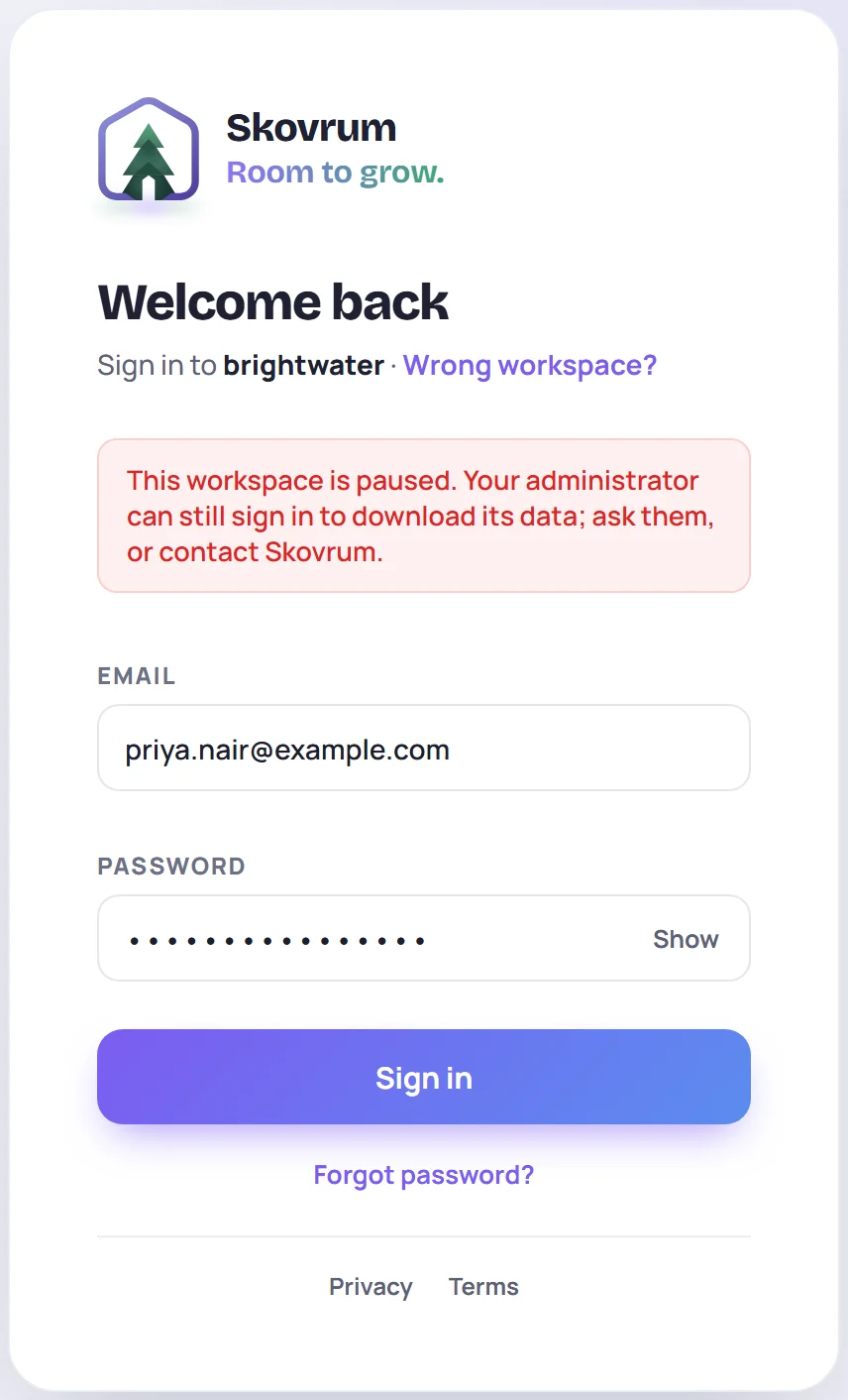 The sign-in screen: This workspace is paused. Your administrator can still sign in to download its data; ask them, or contact Skovrum.